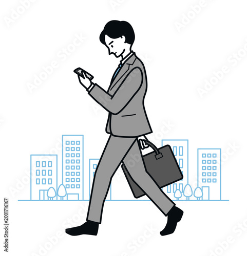 スマホを見ながら歩くビジネスマン