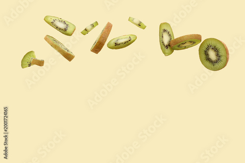 Flying kiwi fruit slices is...