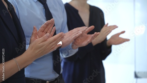 Картината върху платно Business people are clapping hands, expressing gratitude and acknowledging a suc