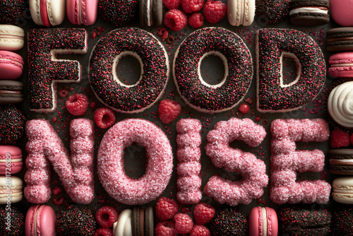 Food noise concept, cravings, diet culture and obsessive thoughts about temptation spelled in donuts and sugar letters.
