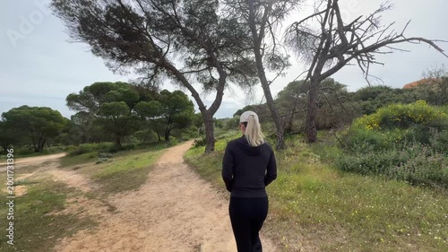 Walking On The Narrow Pathway Near Shoreline Of Algarve, Portugal. POV