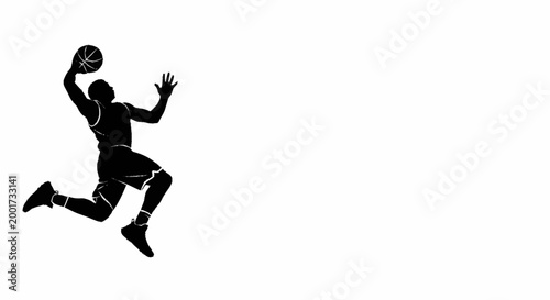 Silhouette of a basketball player jumping to dunk a ball