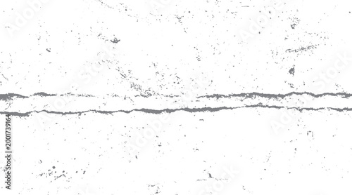 Distressed grunge texture with horizontal crack and scattered speckles on white background