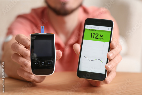 Diabetic young man with glu...