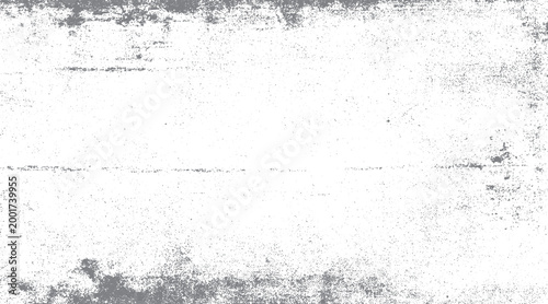 Faded grey distressed texture with scattered dots and rough edges on a white background grunge