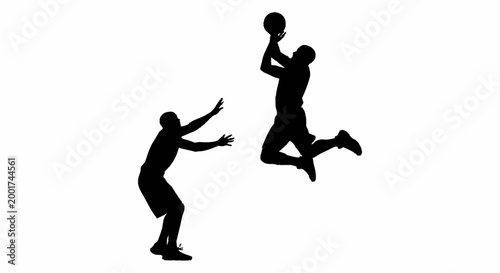 Silhouettes of two basketball players jumping and defending