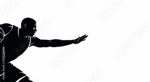 Silhouette of a basketball player reaching out