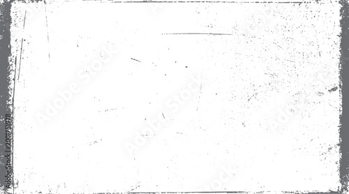 Distressed grunge texture with white background and grey distressed border and scattered dots