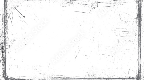 Distressed grey grunge border with scattered speckles and scratches on white background texture