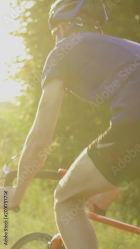 A cyclist trains before a competition. Or an active break after a sedentary day at work.