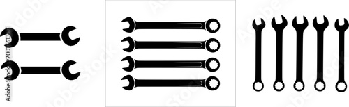 A meticulously crafted double-ended vintage crescent wrench set showcases timeless craftsmanship in its elegant black-and-white design