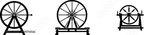 A vintage wooden spinning wheel flyer stands proudly in a rustic setting, its intricate design and sturdy construction hinting at the craftsmanship of yesteryears
