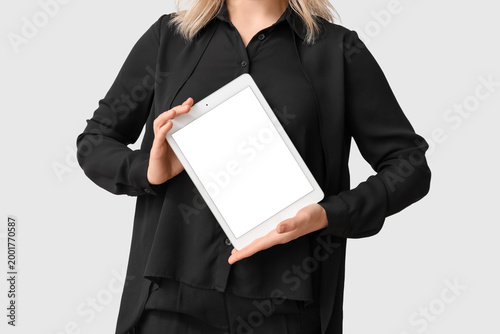 Young woman holding modern ...