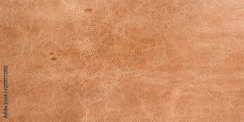 An exquisite, detailed close-up of supple tan leather, revealing its natural texture and rich tonality, perfect for showcasing the beauty of the material.