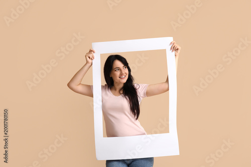 Portrait of happy young wom...