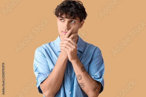 Portrait of pondering young...