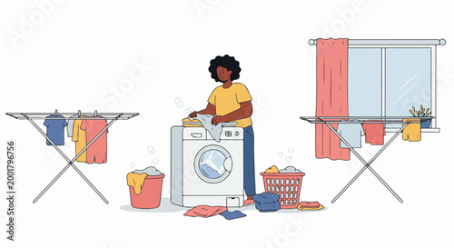 African American woman doing laundry, using a washing machine and hanging clothes on drying racks in a bright room.