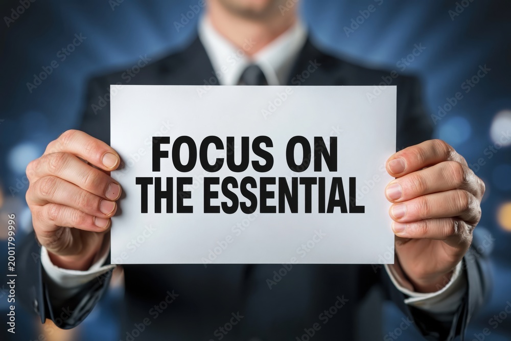 Obraz premium A Man in a Suit with a Focus on the Essential Sign