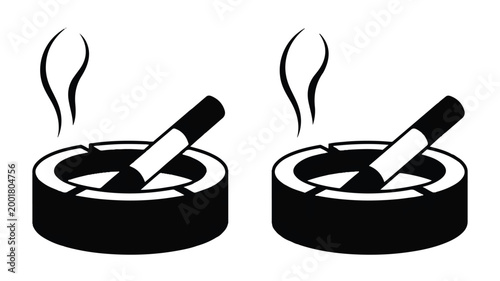 smoking cigarette butts in ashtrays with smoke rising
