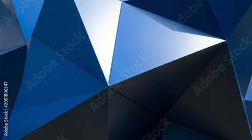 An abstract glowing portal shines brightly in a dark environment with geometric shapes and blue hues.