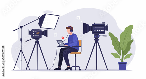 Professional video production and live streaming studio setup with a man working on a laptop and high-quality cameras on tripods.