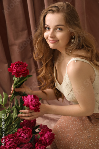 Beautiful young woman with ...