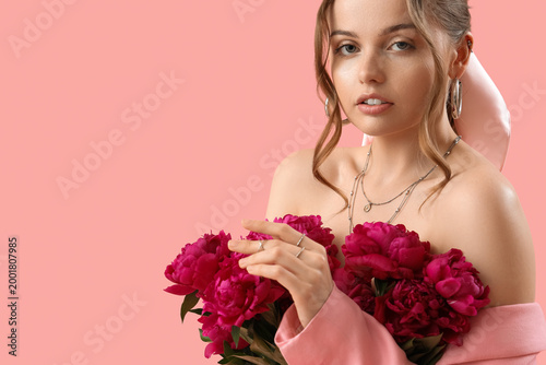 Beautiful young woman with ...