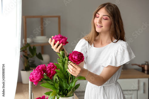 Beautiful young woman with ...