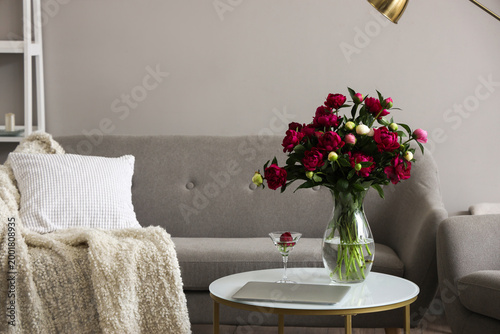 Vase with red peonies, glas...