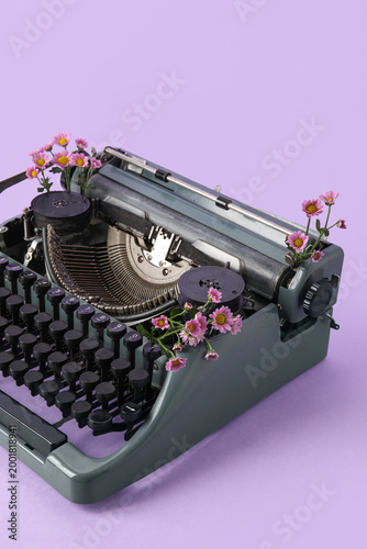 Vintage typewriter on lilac...