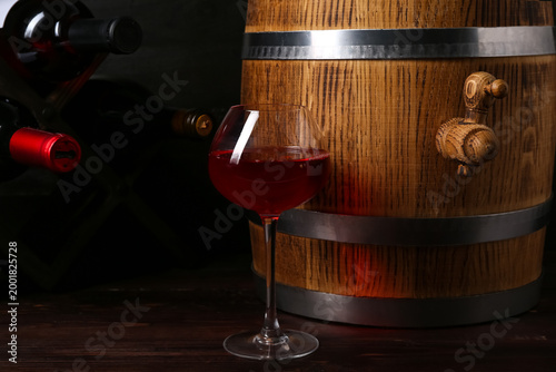 Oak barrel and glass of win...