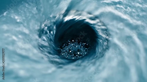 Water Flowing Into a Drain: Mesmerizing Swirls and Vortexes in Motion