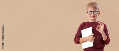 Little boy with tablet comp...