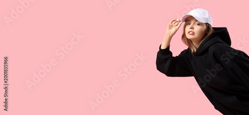 Young woman in black hoodie...