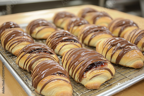 Homemade mini croissants with jam, chocolate, and nuts