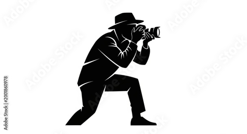 Tableau sur toile Silhouette of a Photographer with Camera in Action.
