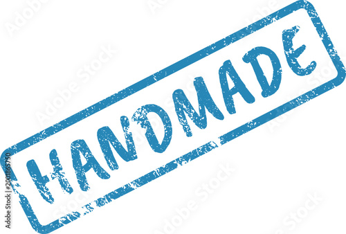 Blue handmade textured stamp on white surface for authentic craft products