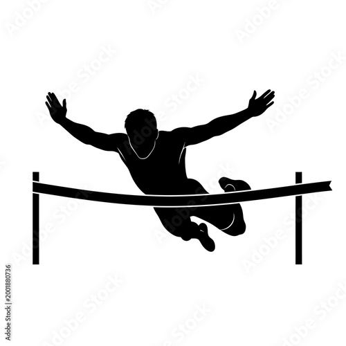 Athlete jumping over finish line ribbon in silhouette.