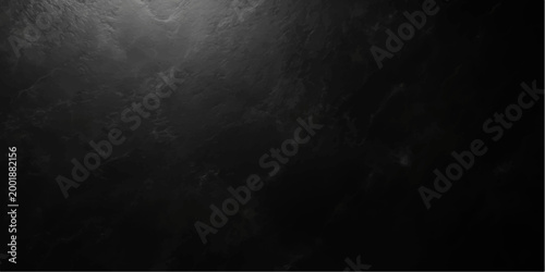 A dark grunge film background with an alpha channel features an abstract texture of black smoke and blue moonlight mist drifting through a dark night sky