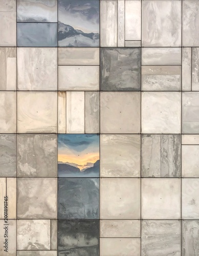 Wall composed of various marble tiles with landscape reflections