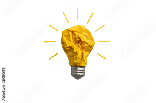 Crumpled yellow paper light bulb with radiating idea