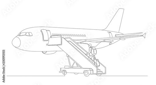 Airplane on a loading stairway outdoors.