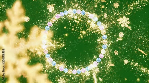 A vibrant circular arrangement of shimmering gems and golden sparkles is displayed against a solid green background, creating a visually striking and magical effect.