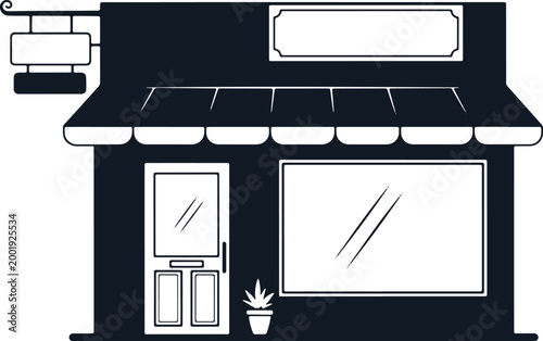 Storefront building facade with awning door and window shop retail business exterior.