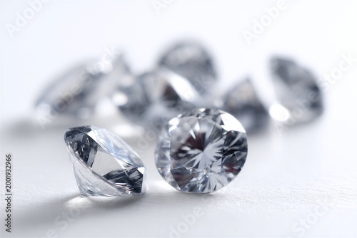 Clear diamonds on white surface in luxury style