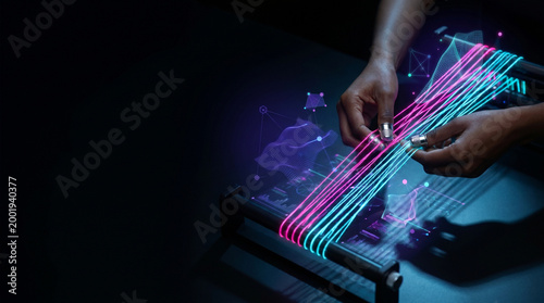 Hands manipulating digital holographic lines in a tech environment  