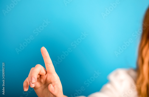 Hand with finger pointing o...