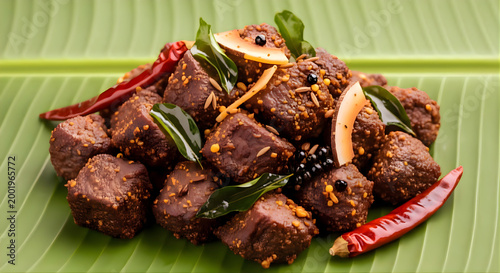 Kerala Beef Fry - Spicy Indian Meat Dish on Banana Leaf