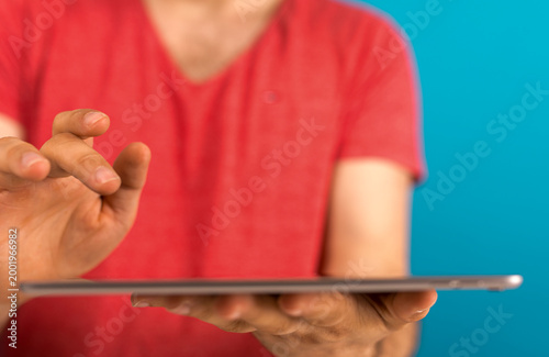 Person using a tablet compu...