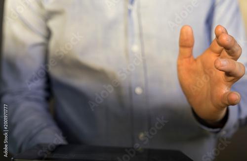 Close-up of a man's hand ge...